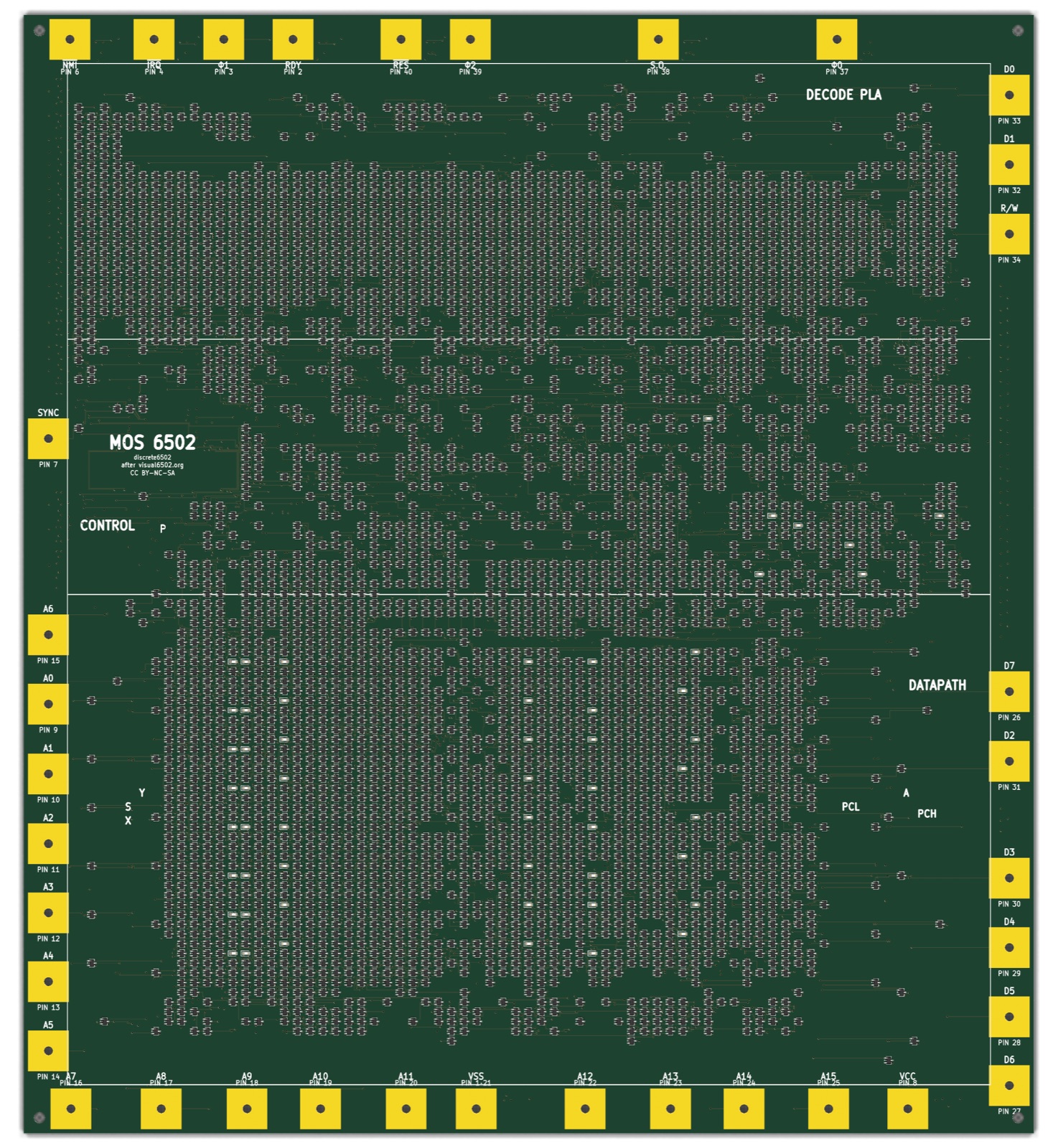 The front of the discrete6502 board: thousands of tiny black transistor packages arranged in the pattern of the 6502 die, surrounded by gold bond pads labelled with the chip's pin names.